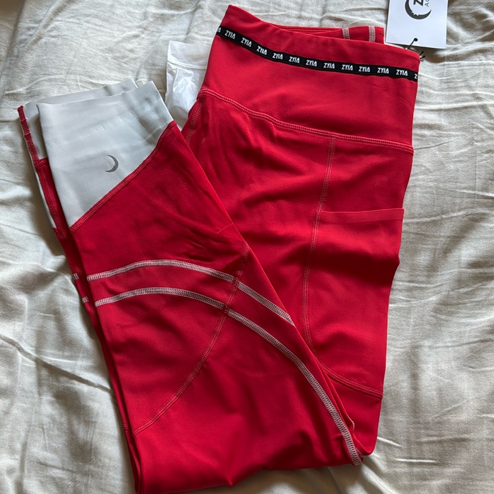 ZYIA gray on red game say light n tight pocket 7/8 24” (12)